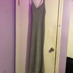 Worn a few times, hem taken in at bottom.